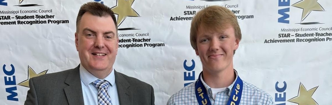Star Teacher: Dr. Brent Grisham and 
Star Student: Clayton Thurmond at Jackson award ceremony. 